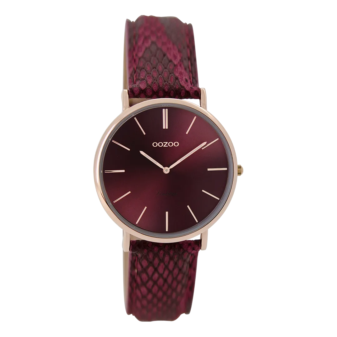 Rose gold coloured  watch with burgundy leather strap